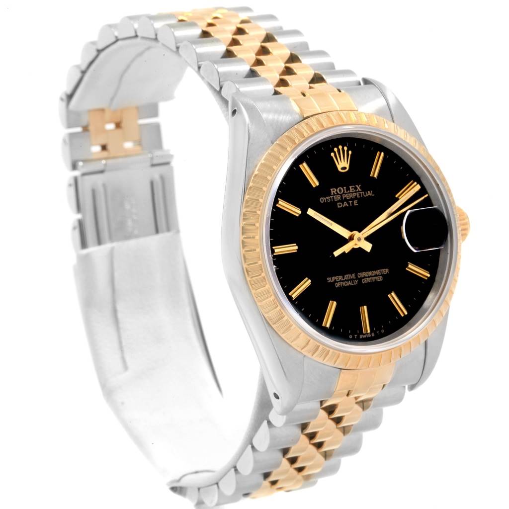 This Rolex Date 15223 Men's Steel and Gold (two tone) Black Dial 15223 Men's Steel and Gold (two tone) Black Dial model watch is shown at an angled view, showcasing the dial, bezel, and two-tone jubilee bracelet.