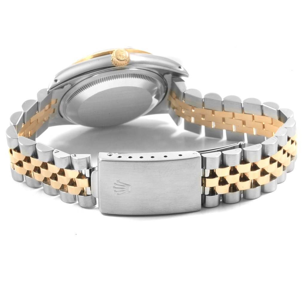 The image shows the back and bracelet clasp of a Rolex Date 15223 Men's Steel and Gold (two tone) Black Dial 15223 Men's Steel and Gold (two tone) Black Dial model watch, highlighting its two-tone metal finish.