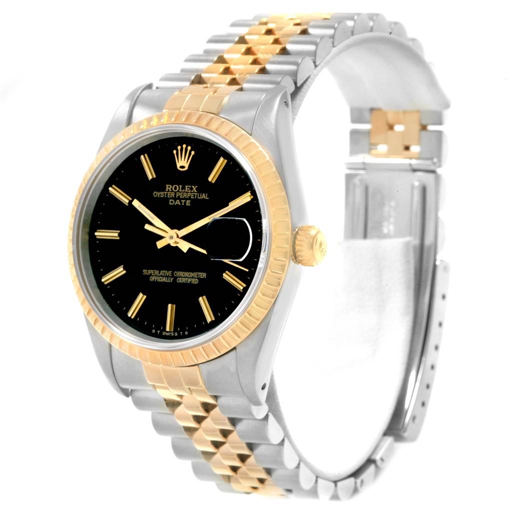 The image shows a Rolex Date 15223 Men's Steel and Gold (two tone) Black Dial 15223 Men's Steel and Gold (two tone) Black Dial model watch at a three-quarter angle, highlighting its face, bezel, and two-tone bracelet.