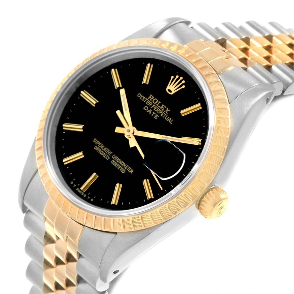 The image shows a close-up of a Rolex Date 15223 Men's Steel and Gold (two tone) Black Dial 15223 Men's Steel and Gold (two tone) Black Dial model watch, displaying the dial, bezel, crown, and part of the bracelet.