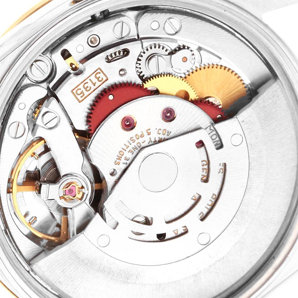 This image shows the internal movement mechanism of a Rolex Date 15223 Men's Steel and Gold (two tone) Black Dial 15223 Men's Steel and Gold (two tone) Black Dial watch model viewed from the back.