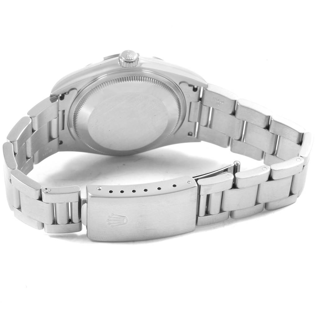 The image shows the back view of a Rolex Date 15200 Men's Stainless Steel White Dial 15200 Men's Stainless Steel White Dial model watch, highlighting its case back and metal bracelet with clasp.