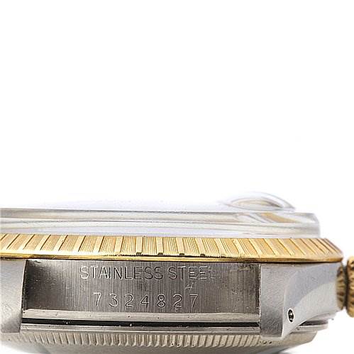 The image shows a side angle of a Rolex Date 15053 Men's Stainless Steel Champagne Dial 15053 Men's Stainless Steel Champagne Dial watch, highlighting the stainless steel casing and serial number.