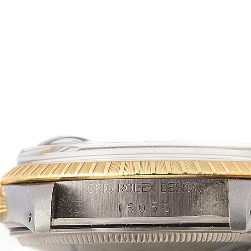 This image shows a side angle of the Rolex Date 15053 Men's Stainless Steel Champagne Dial 15053 Men's Stainless Steel Champagne Dial model 15053, highlighting the bezel and serial number engraving.