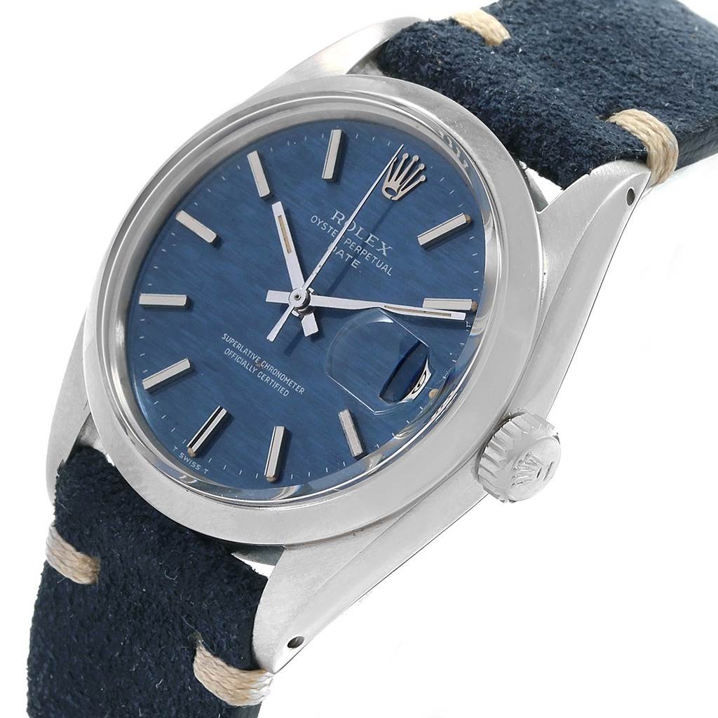 This image shows a Rolex Date 1500 Men's Stainless Steel Blue Dial 1500 Men's Stainless Steel Blue Dial model watch at an angled side view, highlighting its blue dial, crown, and part of the strap.