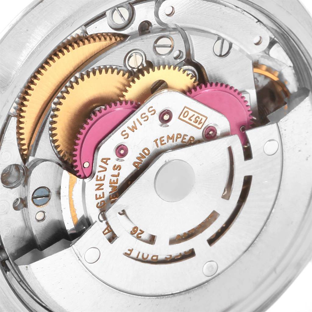 This close-up image shows the intricate inner movement parts of a Rolex Date 1500 Men's Stainless Steel Blue Dial 1500 Men's Stainless Steel Blue Dial model watch.