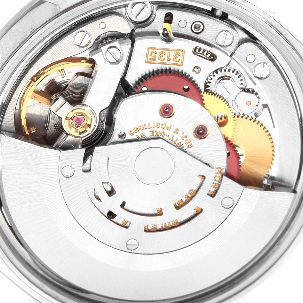 The image shows a close-up view of the Rolex Date 15200 Men's Stainless Steel White Dial 15200 Men's Stainless Steel White Dial model's movement and internal gears.