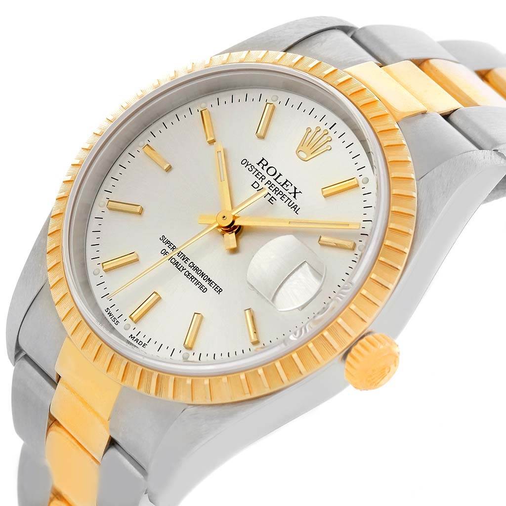 The image shows a Rolex Date 15223 Men's Steel and Gold (two tone) Silver Dial 15223 Men's Steel and Gold (two tone) Silver Dial model watch at a slight angle, highlighting the dial, bezel, crown, and part of the bracelet.