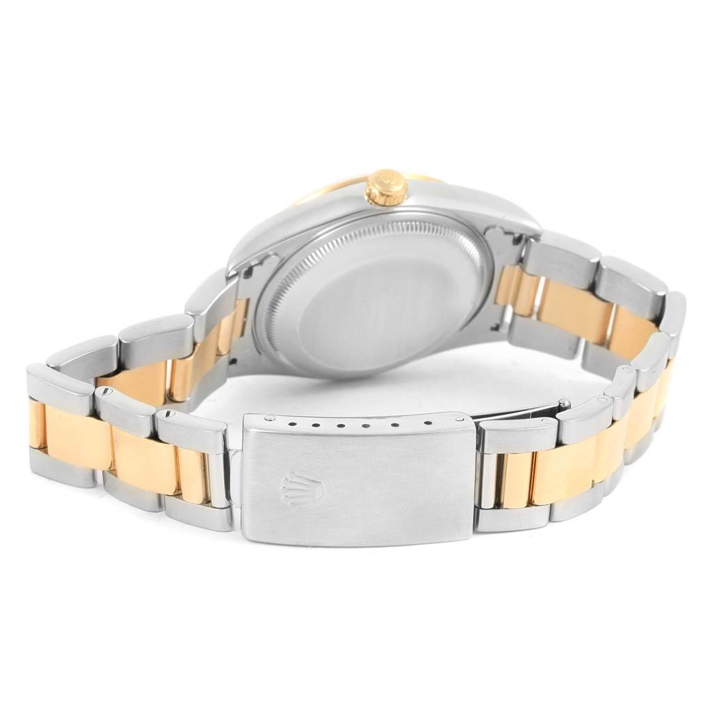 This image shows the backside and bracelet of a Rolex Date 15223 Men's Steel and Gold (two tone) Silver Dial 15223 Men's Steel and Gold (two tone) Silver Dial model watch, highlighting the clasp and case back.