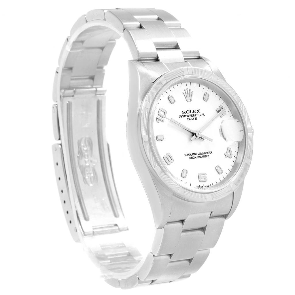 The image shows a Rolex Oyster Perpetual Date model watch, viewed from a front-left angle including the face, bracelet, and clasp.