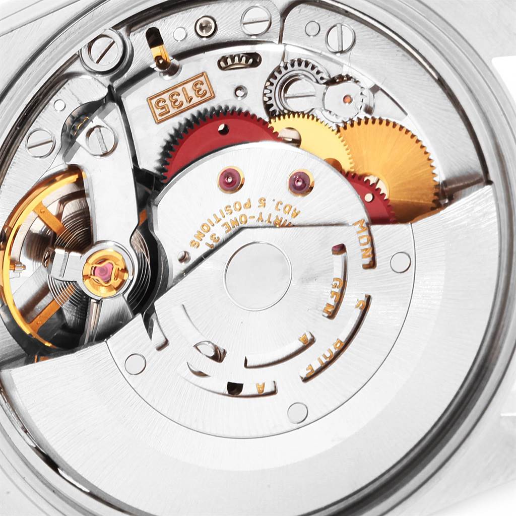The image shows the internal mechanism and movement of a Rolex Date 15210 Men's Stainless Steel White Dial 15210 Men's Stainless Steel White Dial model watch, viewed from the back.