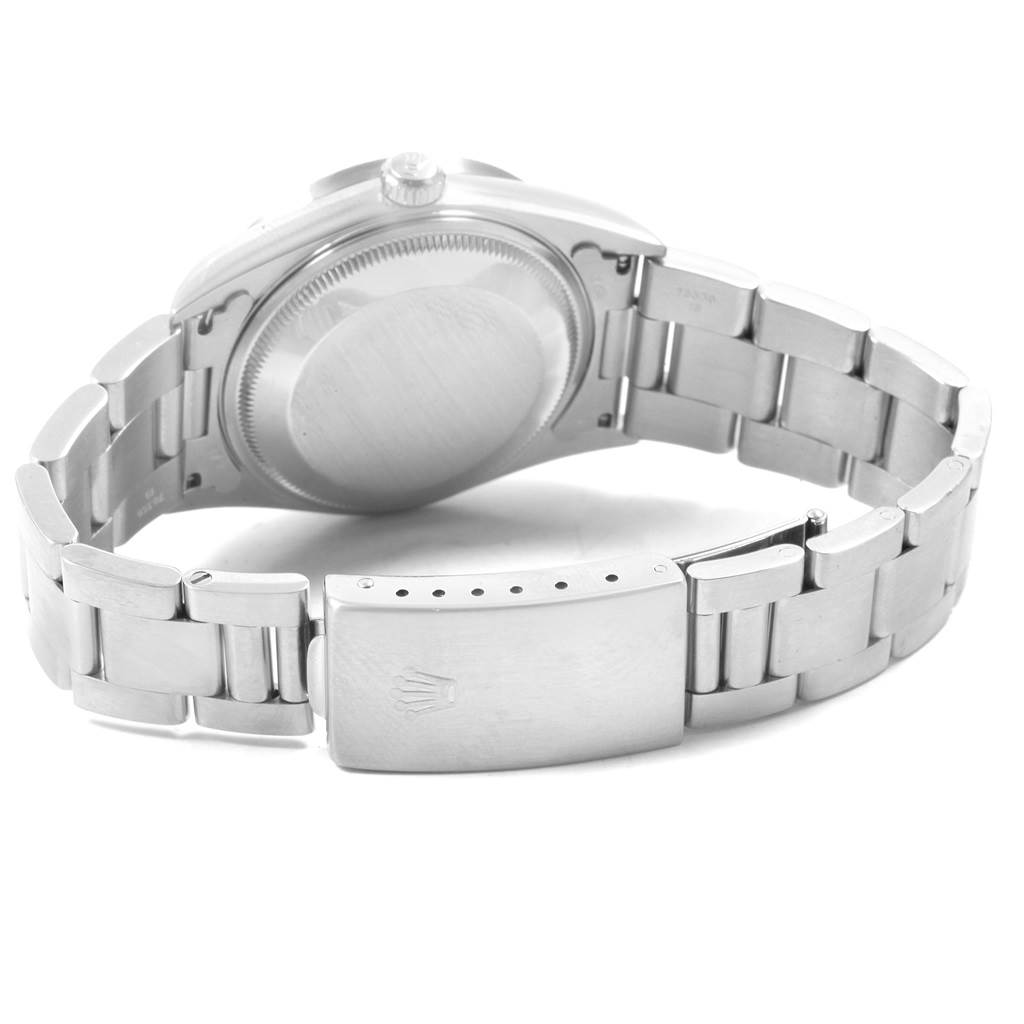 The image shows the back view of a Rolex Date 15210 Men's Stainless Steel White Dial 15210 Men's Stainless Steel White Dial model watch with its bracelet and clasp visible.