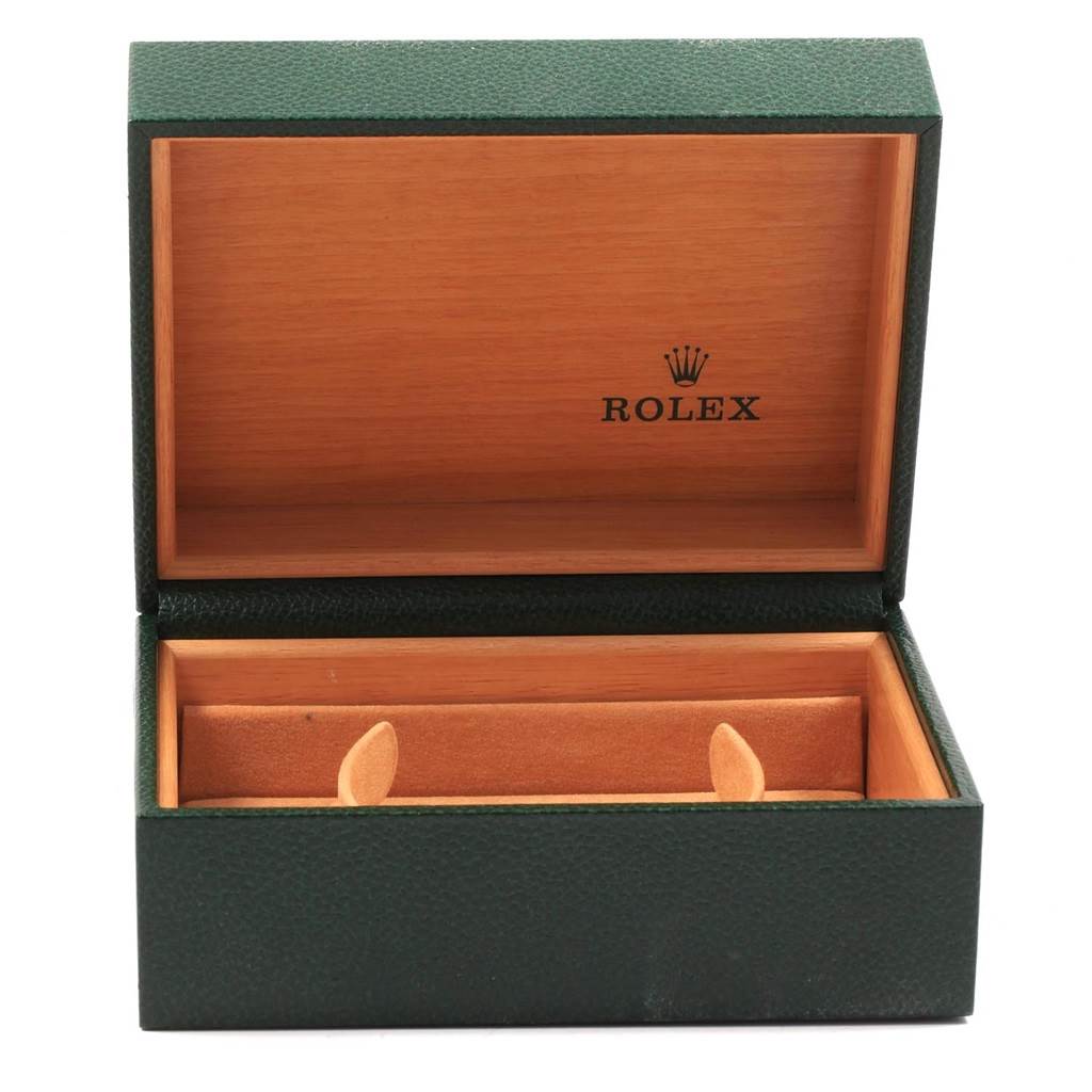 This image shows an open Rolex watch box with a wooden interior used for the Rolex Date 15210 Men's Stainless Steel White Dial 15210 Men's Stainless Steel White Dial model.