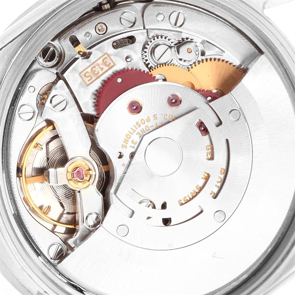 This image shows the internal mechanism of a Rolex Date 15210 Men's Stainless Steel Silver Dial 15210 Men's Stainless Steel Silver Dial model watch, highlighting the gears and other intricate parts.