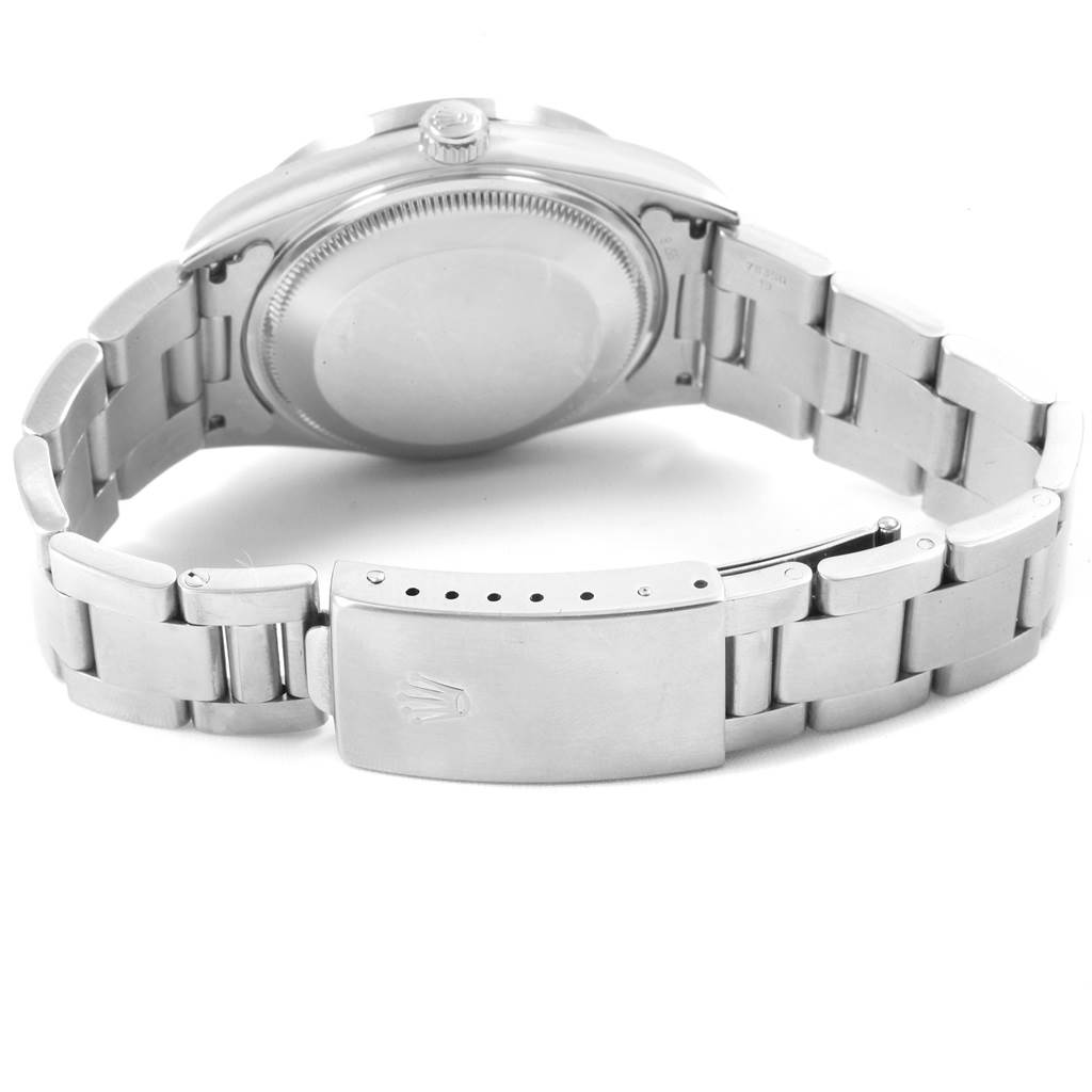 The image shows the back and clasp of a Rolex Date 15210 Men's Stainless Steel Silver Dial 15210 Men's Stainless Steel Silver Dial model watch with an open stainless steel bracelet.