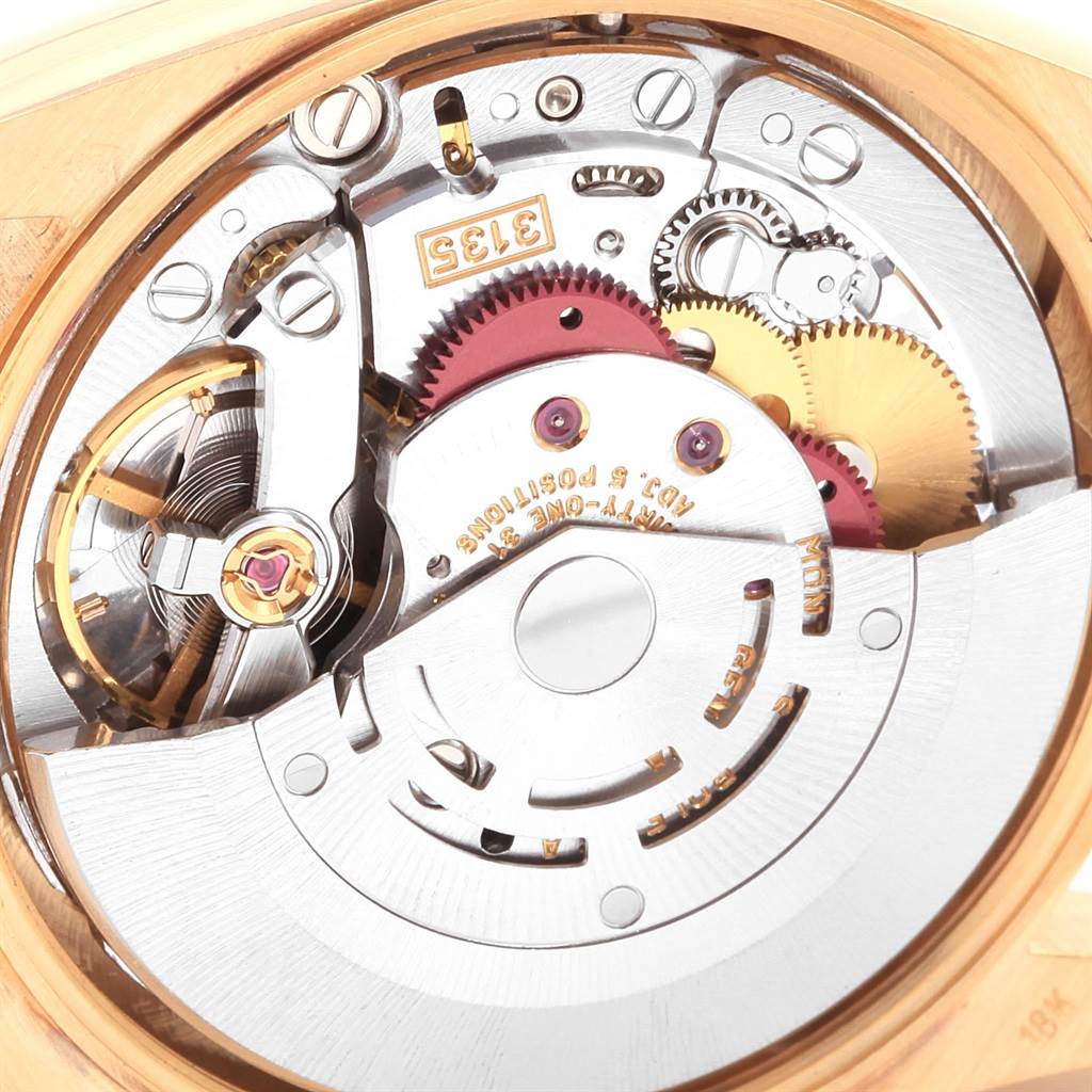 This image shows the intricate inner movement parts of a Rolex Date 15238 Men's Yellow Gold Champagne Dial 15238 Men's Yellow Gold Champagne Dial model watch from a top-down angle.