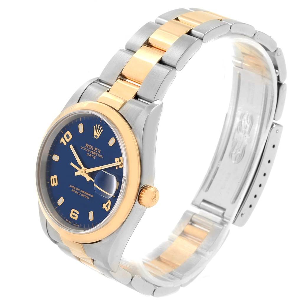 The image shows a side-view angle of a Rolex Date 15203 Men's Steel and Gold (two tone) Blue Dial 15203 Men's Steel and Gold (two tone) Blue Dial model watch, highlighting its two-tone bracelet, blue dial, and gold bezel.