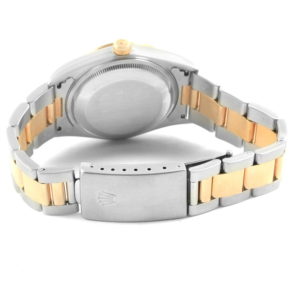 The image shows the back view of a Rolex Date 15203 Men's Steel and Gold (two tone) Blue Dial 15203 Men's Steel and Gold (two tone) Blue Dial model watch, highlighting the case back and the bracelet clasp.