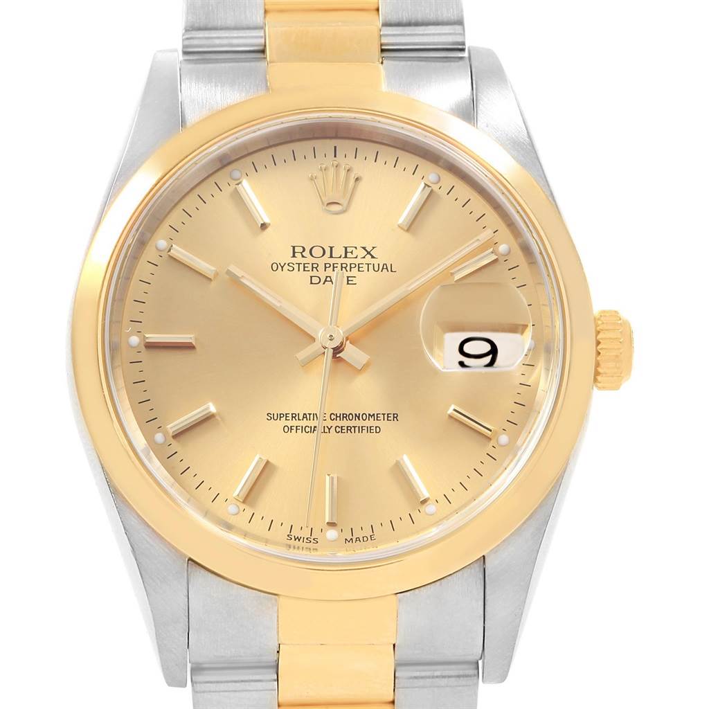 The image shows the watch face and part of the bracelet of a Rolex Oyster Perpetual Date model viewed from the front.