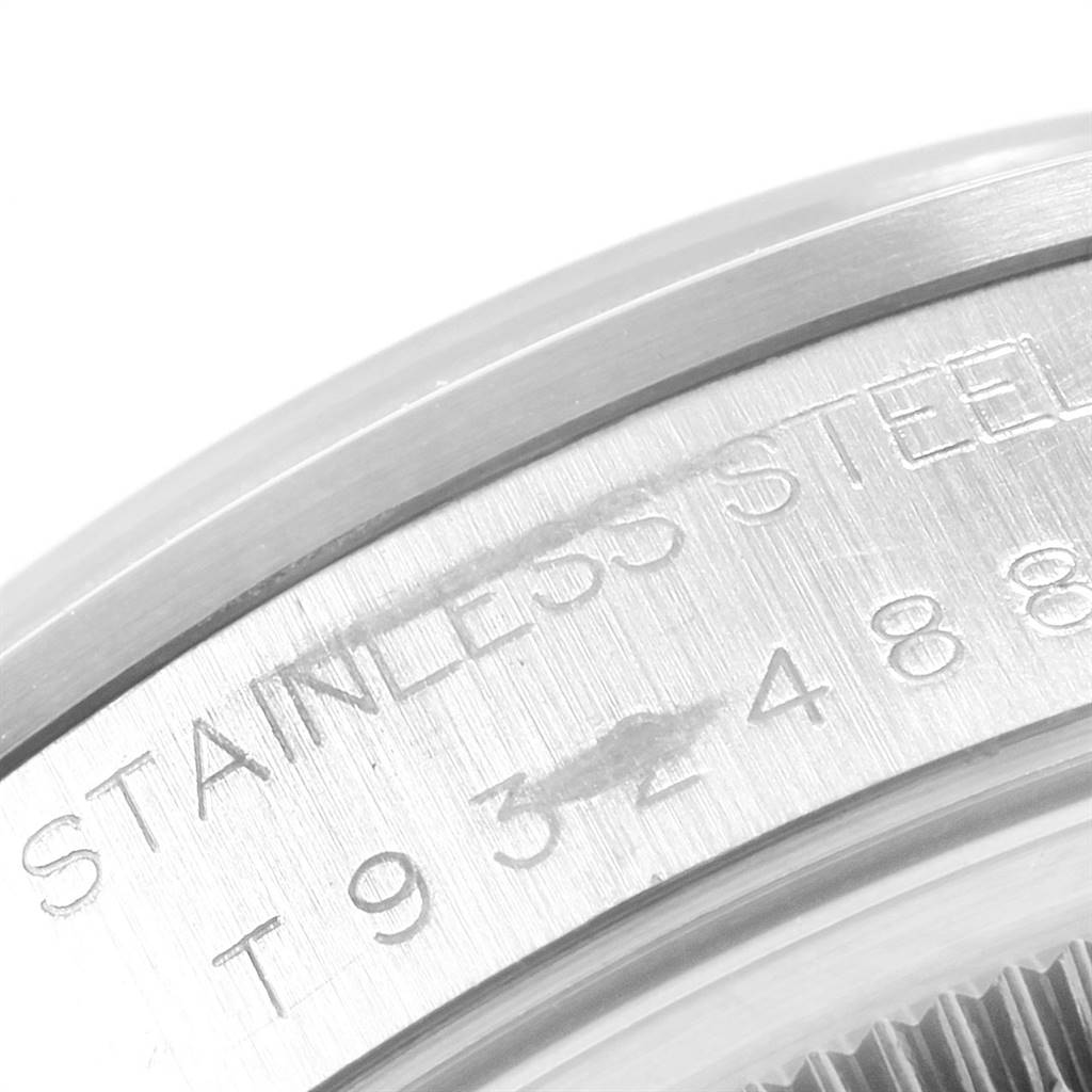 This close-up image shows the engraved stainless steel case back of a Rolex Date 15200 Men's Stainless Steel White Dial 15200 Men's Stainless Steel White Dial model watch.