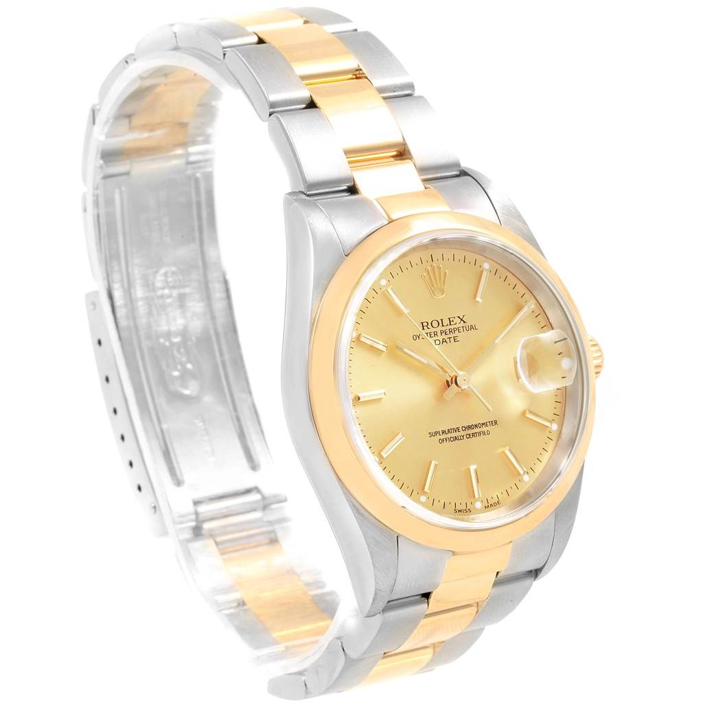 The image shows a Rolex Date 15203 Men's Steel and Gold (two tone) Champagne Dial 15203 Men's Steel and Gold (two tone) Champagne Dial model watch at a three-quarter angle, highlighting the face, bezel, and band.