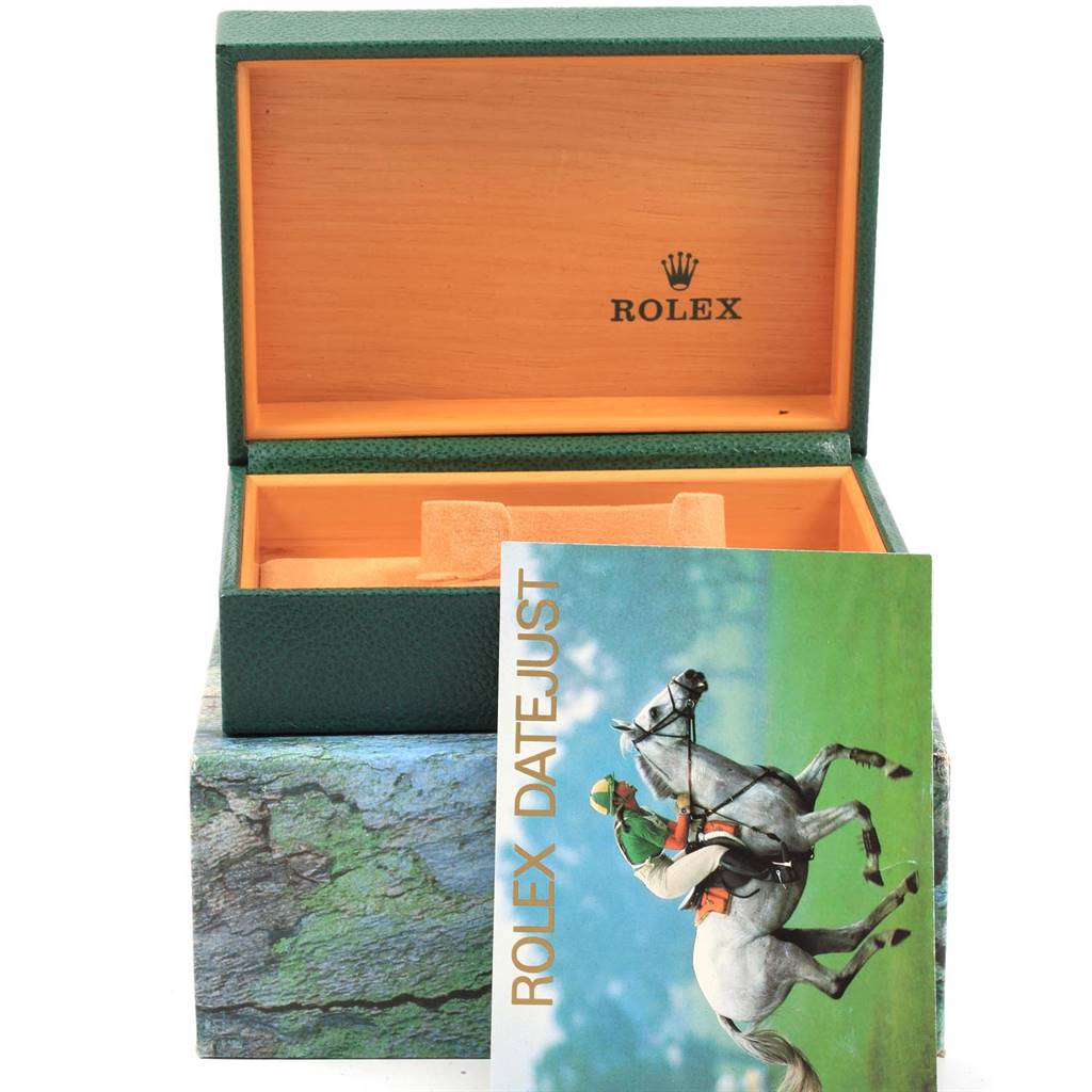 The image shows an open green and wooden Rolex box with a Rolex Date 15210 Men's Stainless Steel White Dial 15210 Men's Stainless Steel White Dial model booklet in front.