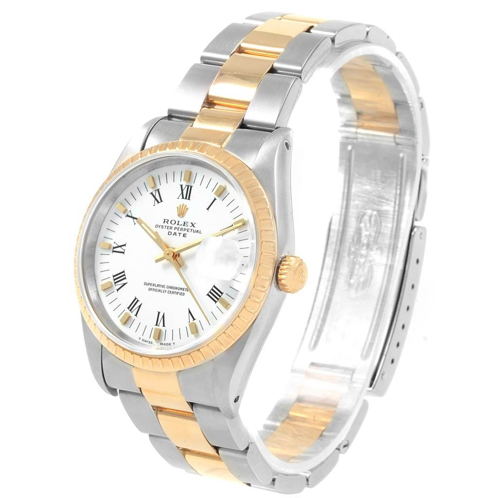 The image shows a Rolex Date 15223 Men's Steel and Gold (two tone) White Dial 15223 Men's Steel and Gold (two tone) White Dial model watch at an angled view, highlighting its dial, bezel, crown, and two-tone bracelet.
