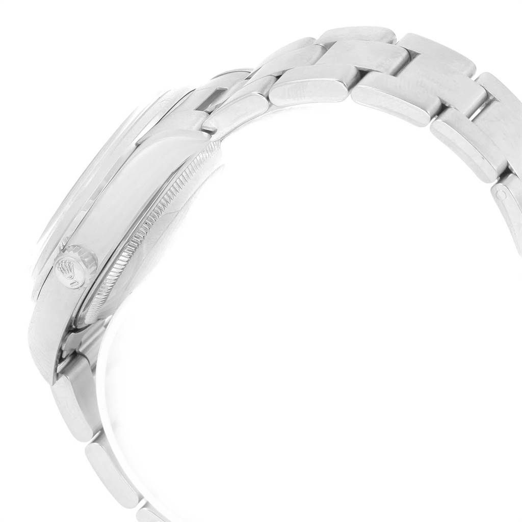 This image shows a side view of the Rolex Date 15200 Men's Stainless Steel White Dial 15200 Men's Stainless Steel White Dial model watch, focusing on the case, crown, and partially the bracelet.