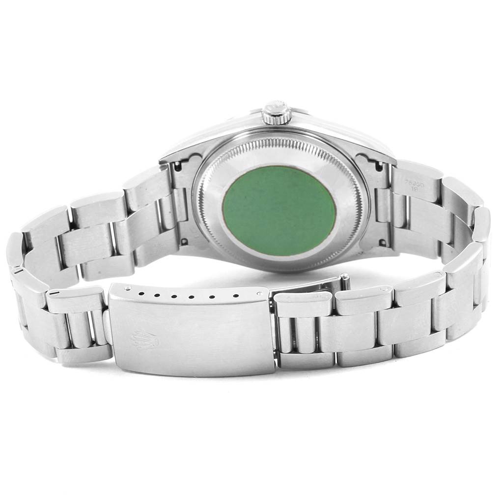 The image shows the back view of a Rolex Date 15200 Men's Stainless Steel Blue Dial 15200 Men's Stainless Steel Blue Dial model watch, displaying its closed clasp, bracelet, and case back.