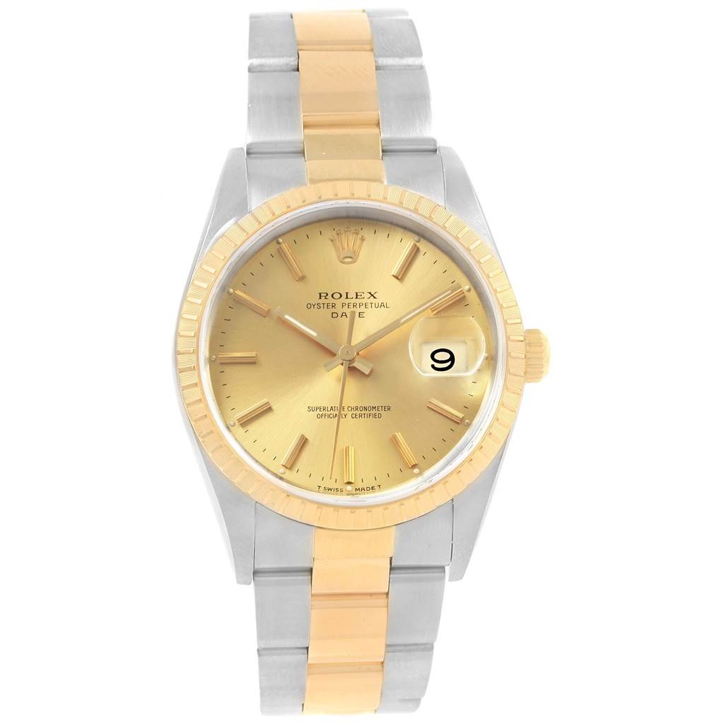 The Rolex Date 15223 Men's Steel and Gold (two tone) Champagne Dial 15223 Men's Steel and Gold (two tone) Champagne Dial model watch is shown from a front angle, displaying its two-tone bracelet, gold face, and date window at 3 o'clock.