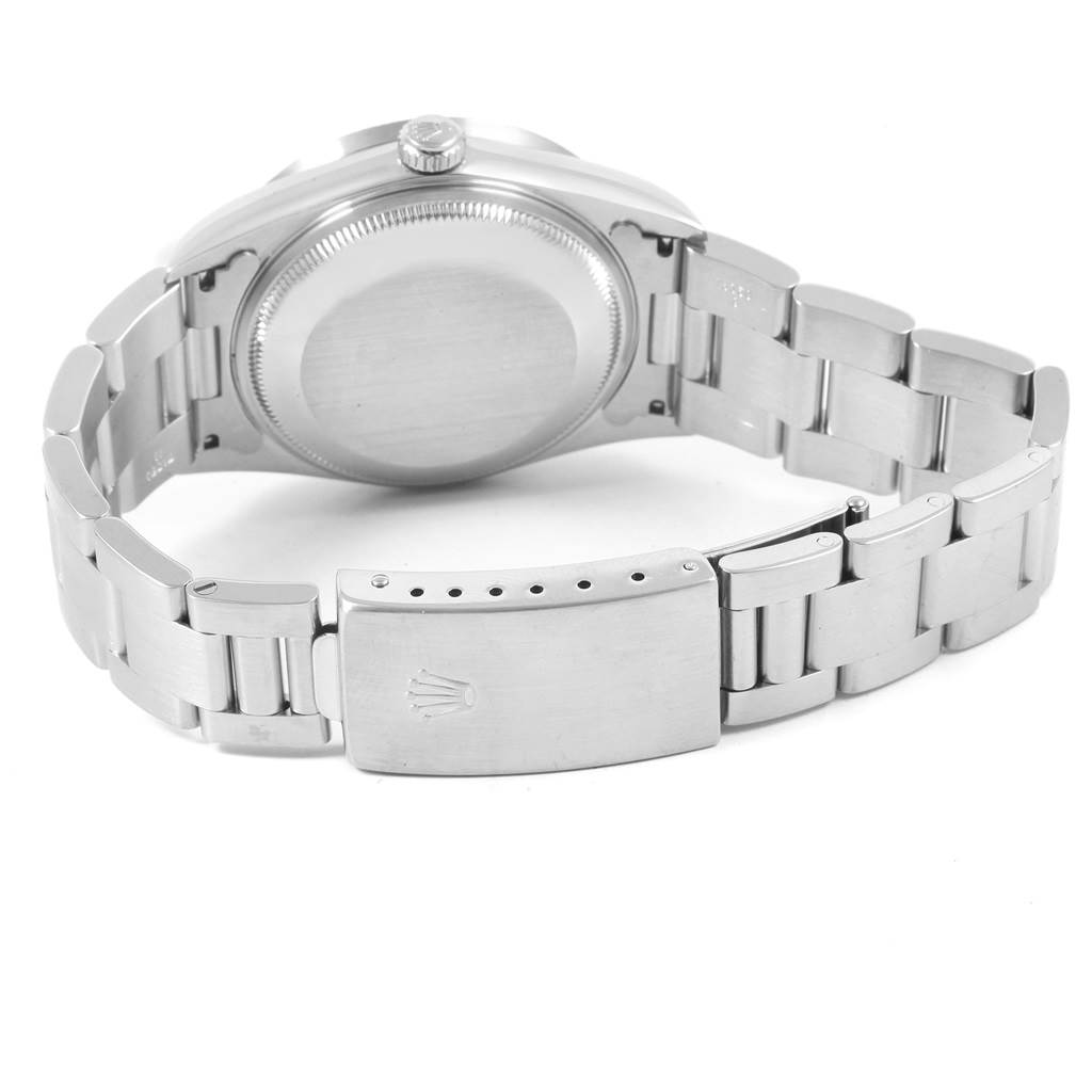 This image shows the back view of a Rolex Date 15210 Men's Stainless Steel Silver Dial 15210 Men's Stainless Steel Silver Dial model watch, highlighting the case back and metal bracelet.