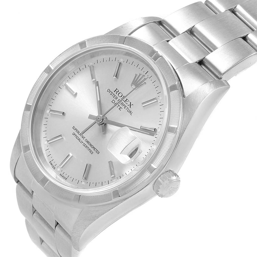 The image shows a close-up of a Rolex Date 15210 Men's Stainless Steel Silver Dial 15210 Men's Stainless Steel Silver Dial model watch at an angled view, highlighting the face, bezel, and part of the bracelet.