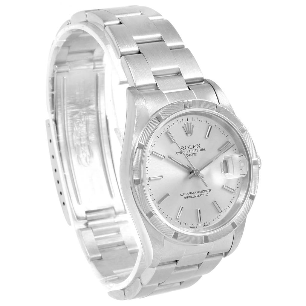 The image shows a side-angle view of a Rolex Date 15210 Men's Stainless Steel Silver Dial 15210 Men's Stainless Steel Silver Dial model watch, displaying the face, bezel, and part of the bracelet.