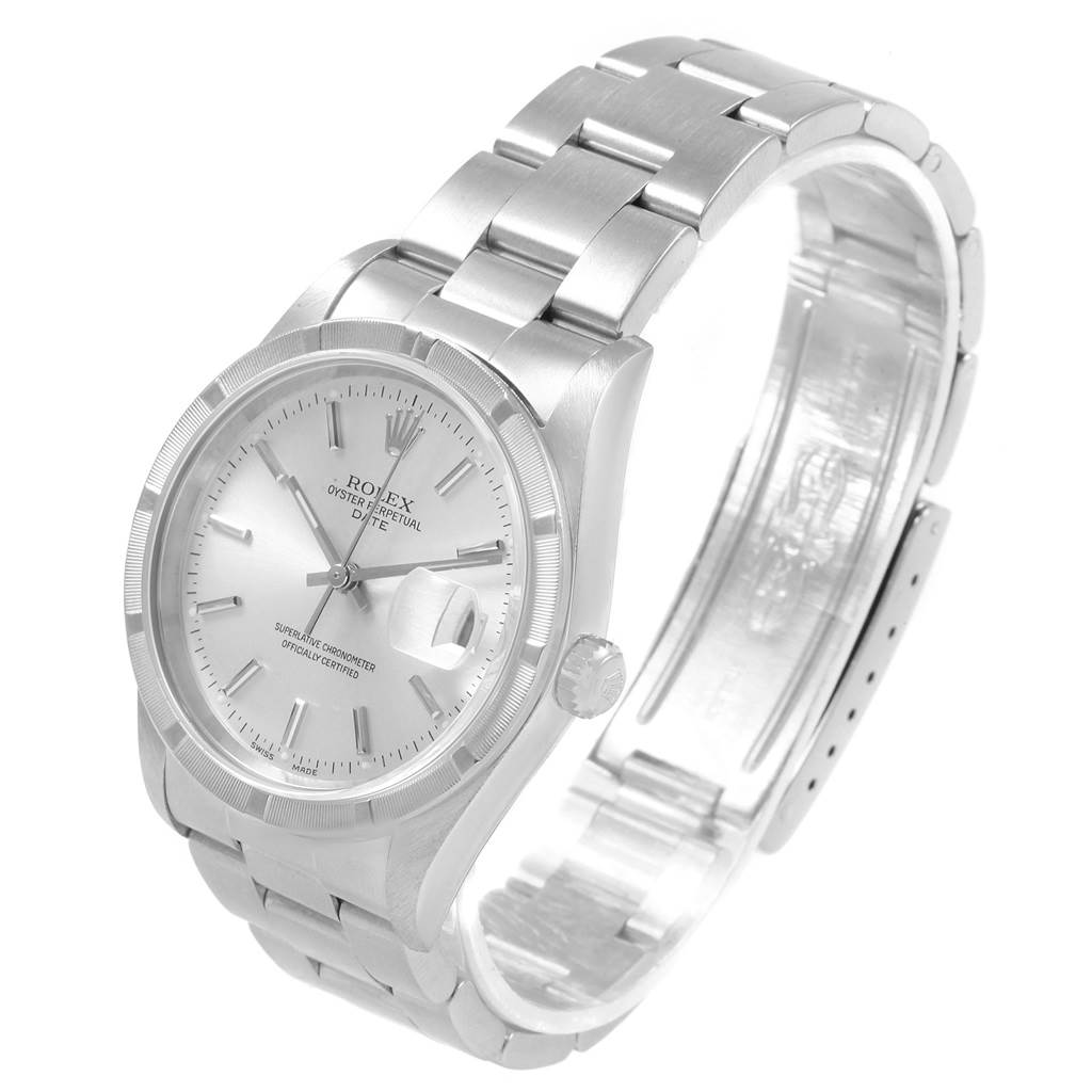 This image shows a side angle of a Rolex Date 15210 Men's Stainless Steel Silver Dial 15210 Men's Stainless Steel Silver Dial model, highlighting the dial, bracelet, and crown.