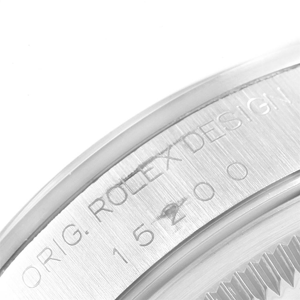 This image shows a close-up of the caseback engraving on a Rolex Date 15200 Men's Stainless Steel White Dial 15200 Men's Stainless Steel White Dial model watch.