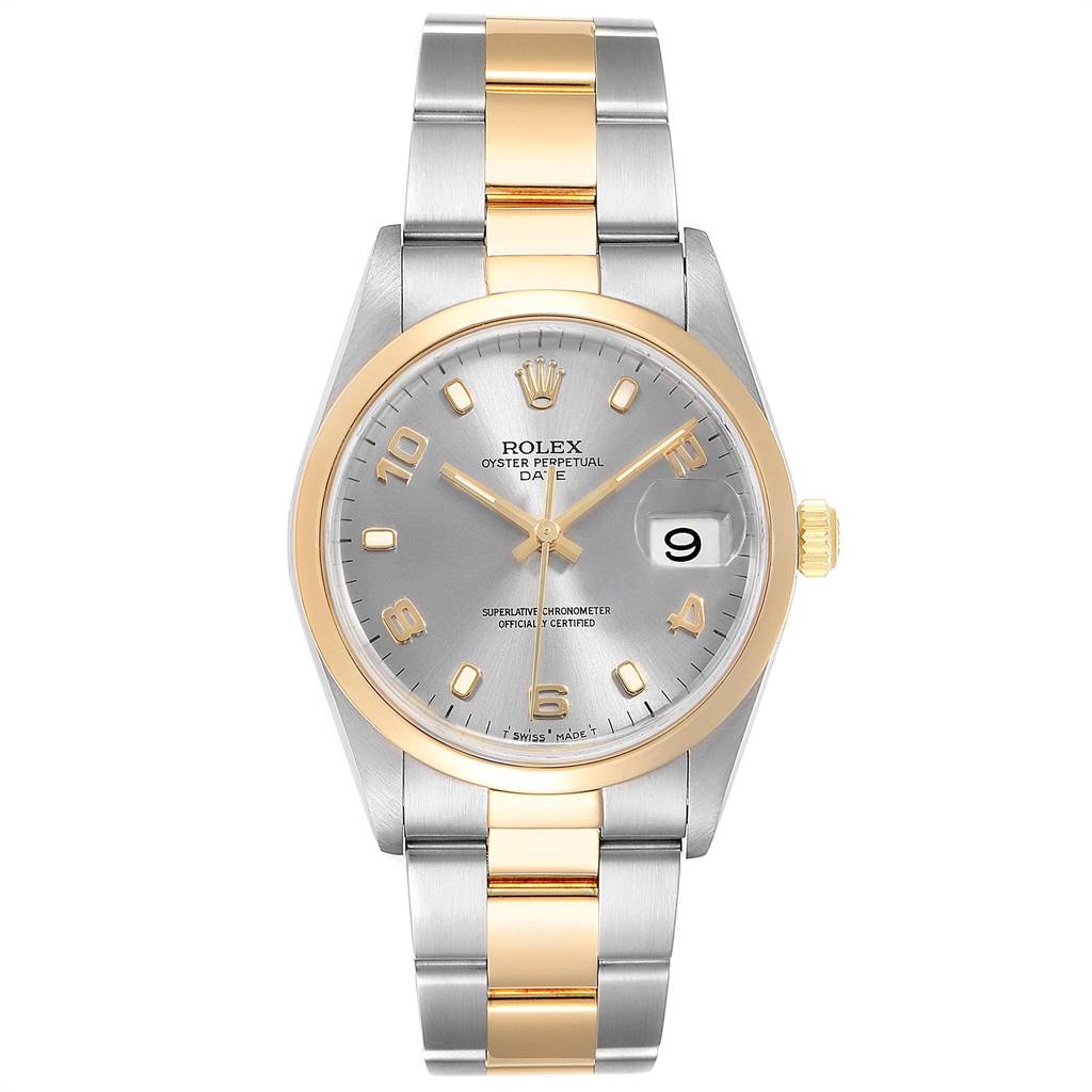 The image shows a front view of a Rolex Date 15203 Men's Steel and Gold (two tone) Grey Dial 15203 Men's Steel and Gold (two tone) Grey Dial watch, featuring a silver dial, gold bezel, and two-tone metal bracelet.
