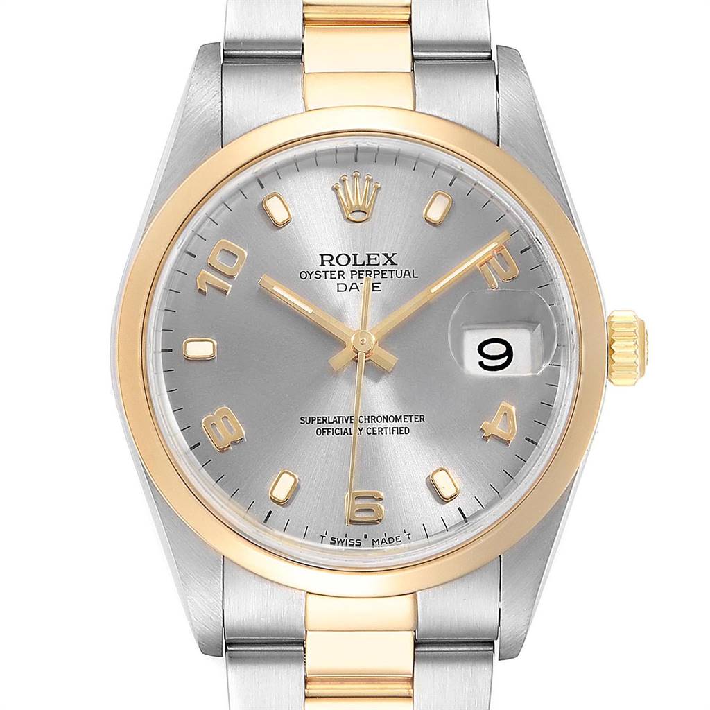 This Rolex Date 15203 Men's Steel and Gold (two tone) Grey Dial 15203 Men's Steel and Gold (two tone) Grey Dial model watch is shown from the front, displaying its dial, hands, crown, and part of the bracelet.