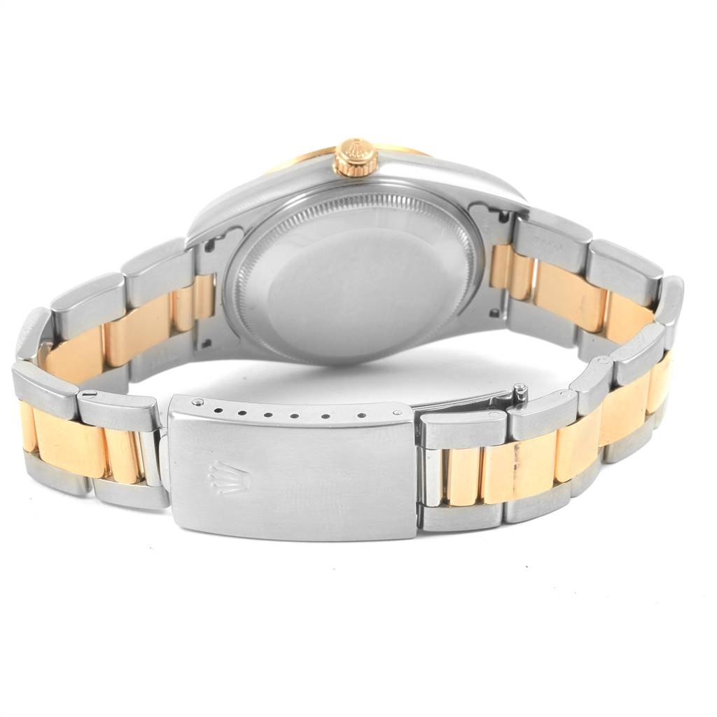 The image shows the back view of a Rolex Date 15203 Men's Steel and Gold (two tone) Grey Dial 15203 Men's Steel and Gold (two tone) Grey Dial model, highlighting its two-tone bracelet and clasp.