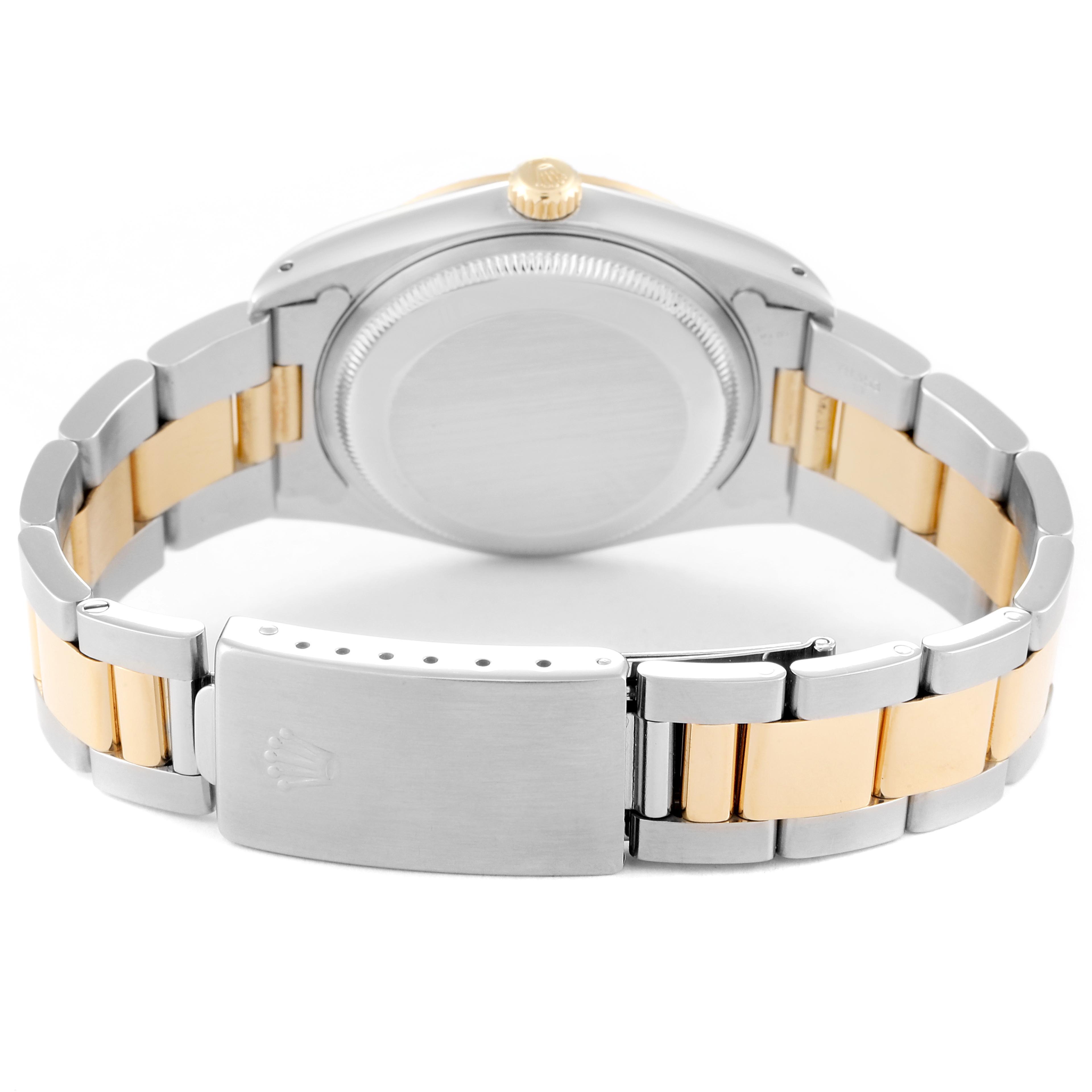 The image shows the back of a Rolex Date 15223 Men's Steel and Gold (two tone) White Dial 15223 Men's Steel and Gold (two tone) White Dial model watch, highlighting the case, bracelet, and the clasp.