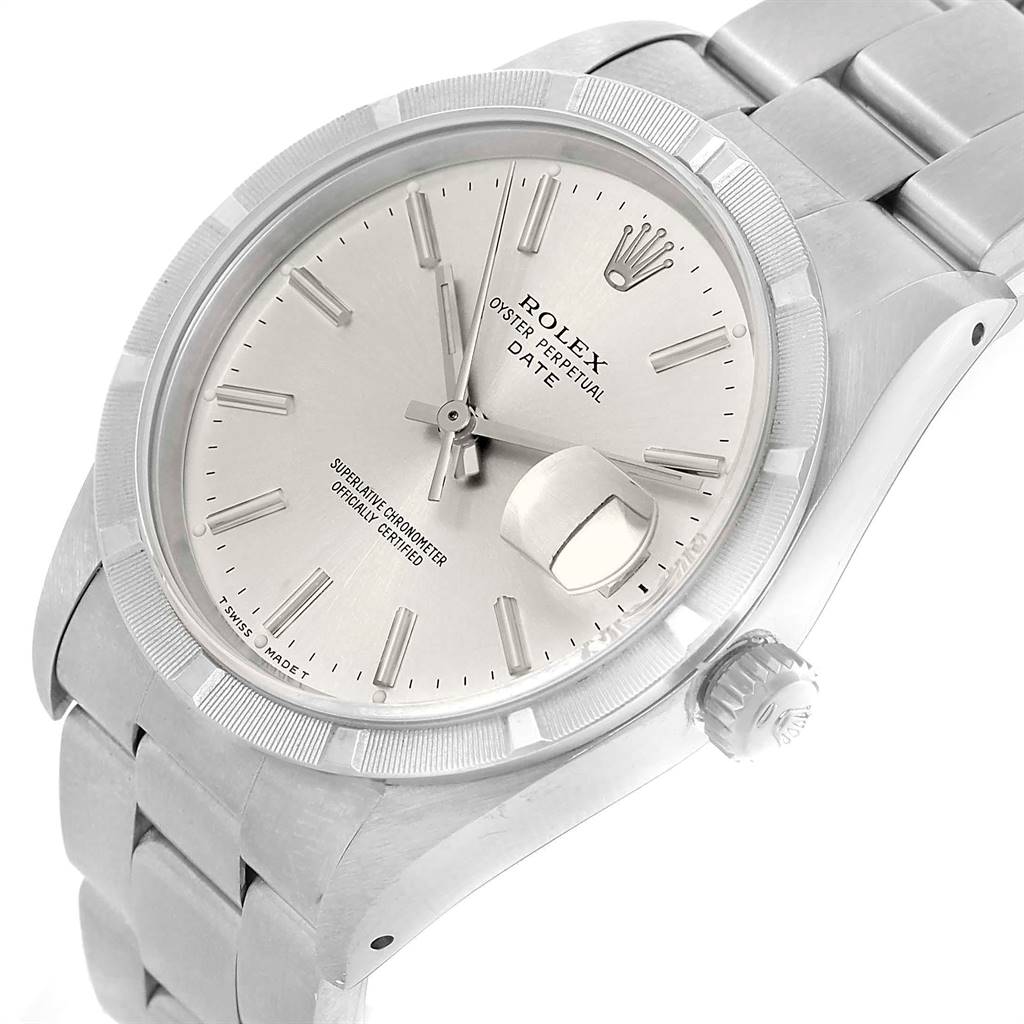 The image shows a close-up angle of a Rolex Date 15210 Men's Stainless Steel Silver Dial 15210 Men's Stainless Steel Silver Dial model watch, highlighting the dial, bezel, crown, and part of the bracelet.