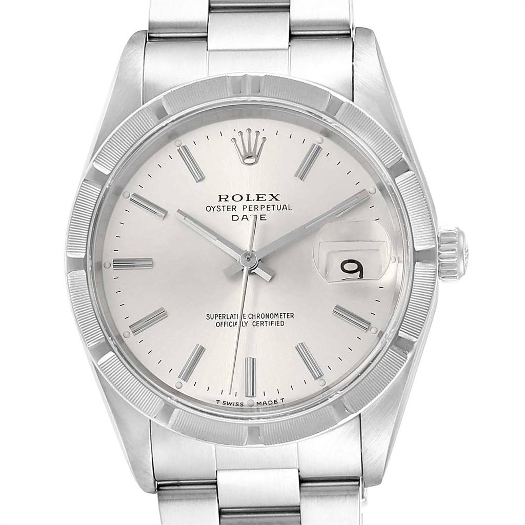 The image shows a front view of a Rolex Oyster Perpetual Date watch, featuring its dial, hands, date window, and a portion of the bracelet.