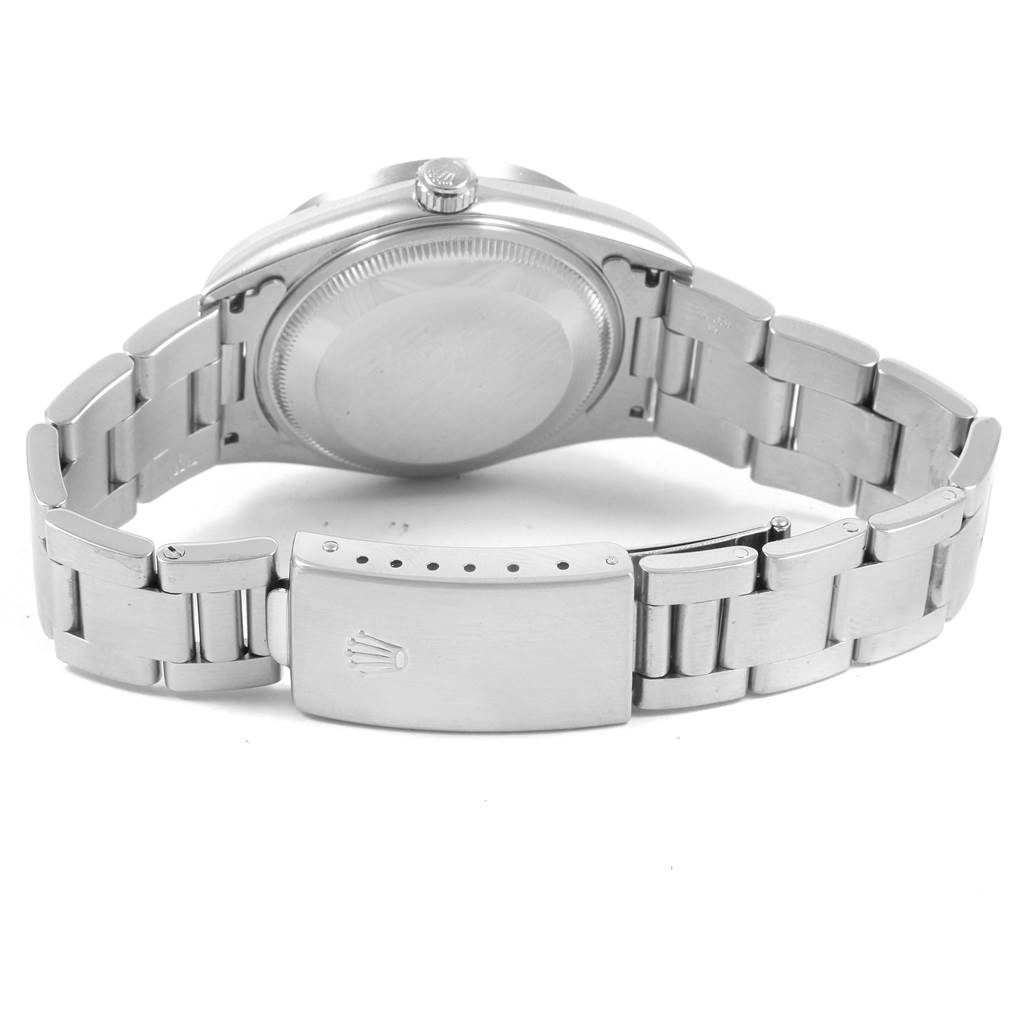 The image shows the back case and bracelet of a Rolex Date 15210 Men's Stainless Steel Pink Dial 15210 Men's Stainless Steel Pink Dial model watch, with the clasp and crown visible.