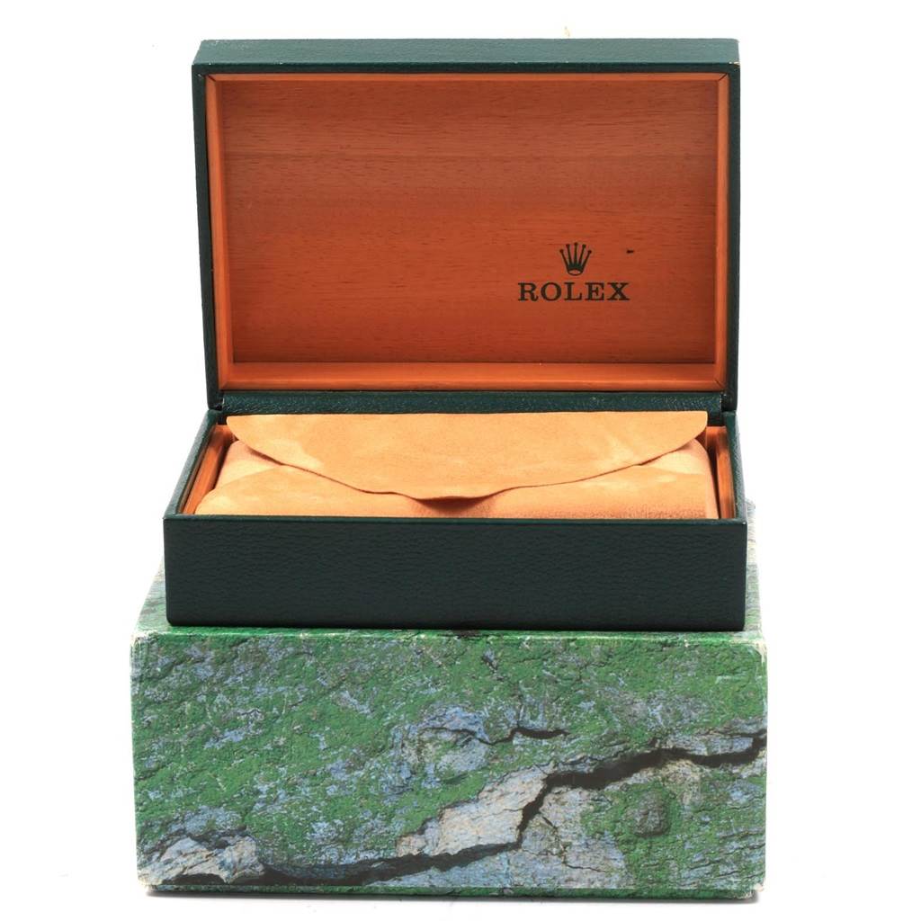 The image shows an open Rolex Date 15210 Men's Stainless Steel Pink Dial 15210 Men's Stainless Steel Pink Dial model watch box, revealing an interior with a soft protective cover.