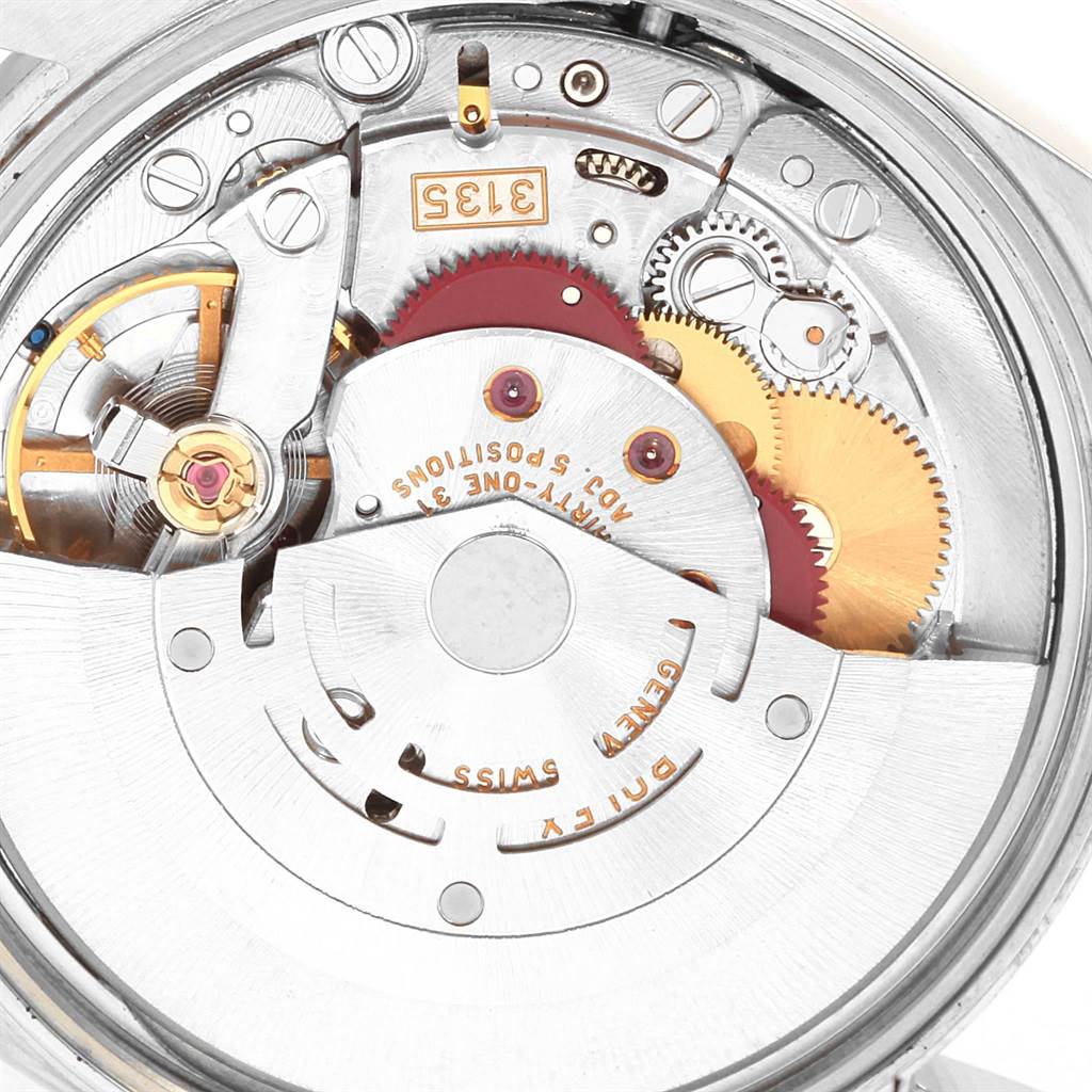 This image shows the inner mechanical components and movement of a Rolex Date 15210 Men's Stainless Steel Pink Dial 15210 Men's Stainless Steel Pink Dial model watch.