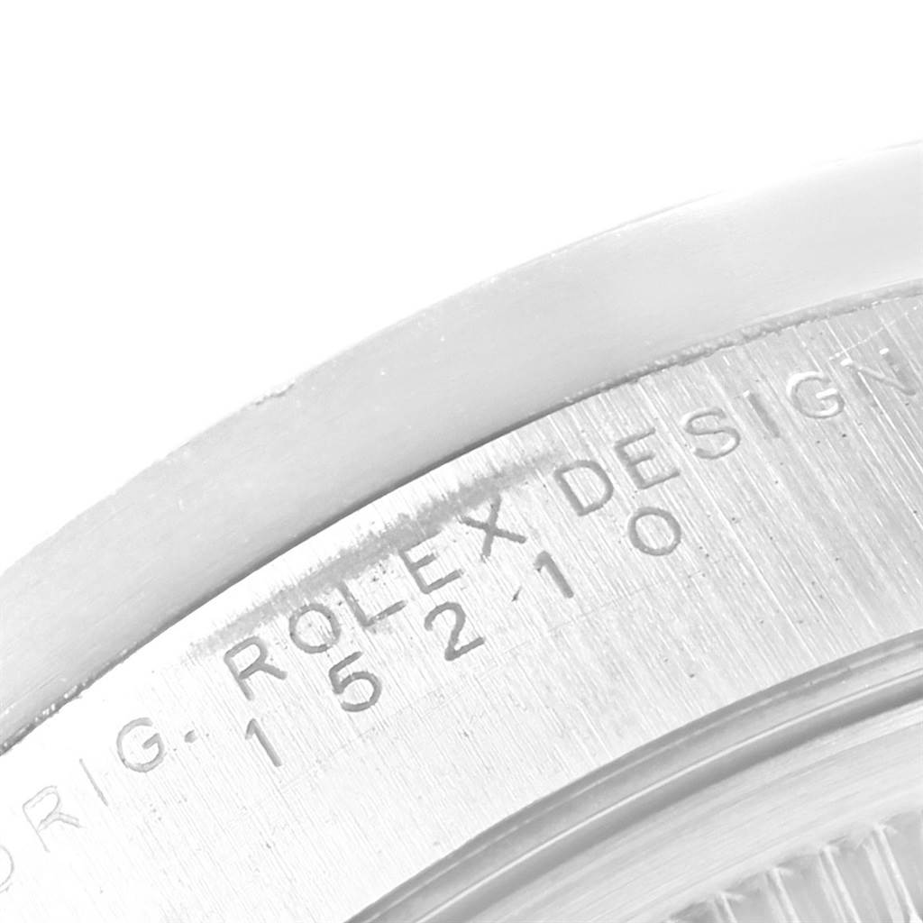This image shows a close-up angle of the engraved model number on a Rolex Date 15210 Men's Stainless Steel Pink Dial 15210 Men's Stainless Steel Pink Dial watch.