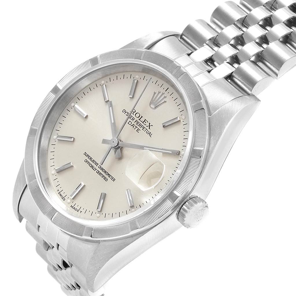 The image shows a close-up angled view of a Rolex Date 15210 Men's Stainless Steel Silver Dial 15210 Men's Stainless Steel Silver Dial model, displaying the dial, bezel, crown, and bracelet.