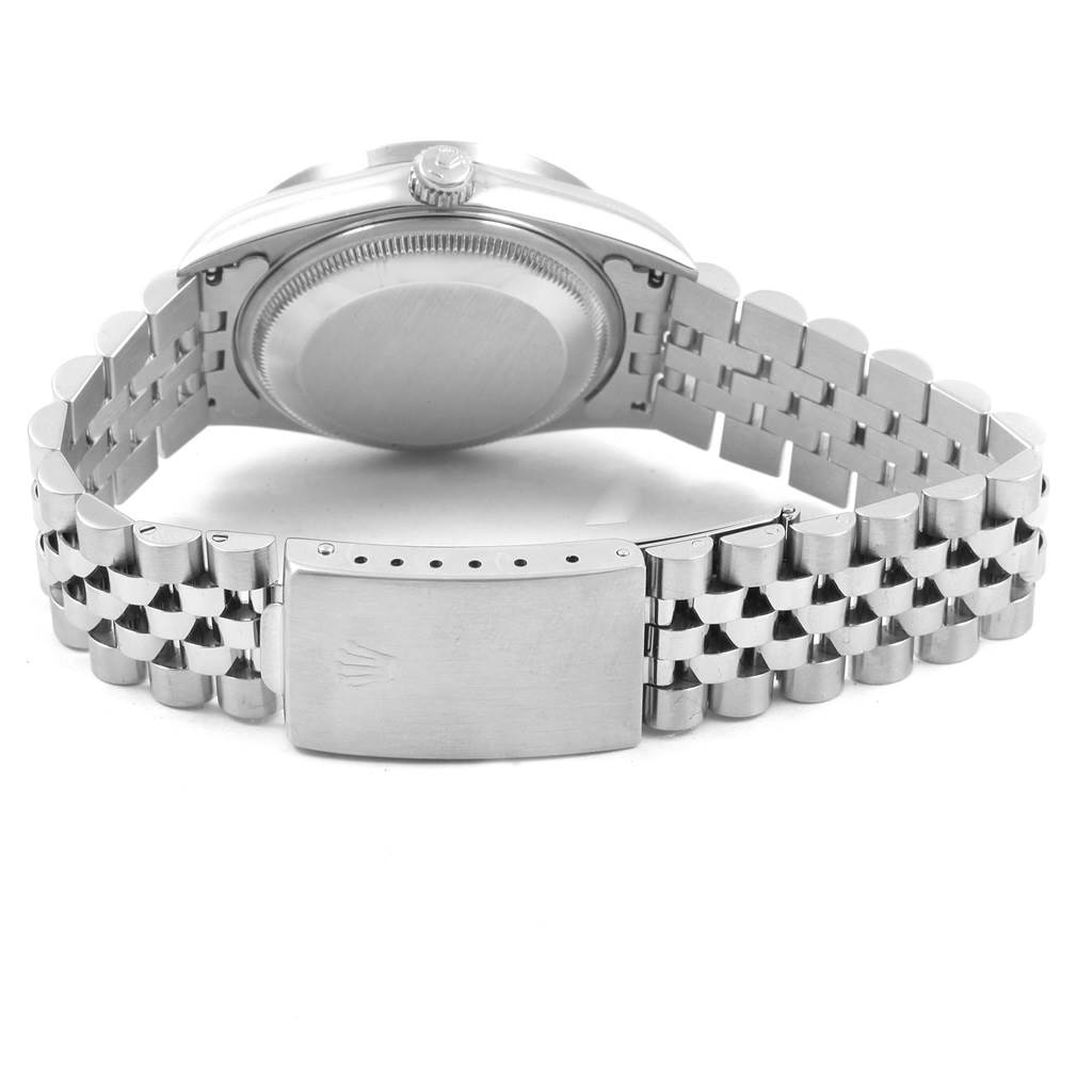 The image shows the back and clasp of a Rolex Date 15210 Men's Stainless Steel Silver Dial 15210 Men's Stainless Steel Silver Dial model watch, featuring its metal bracelet.