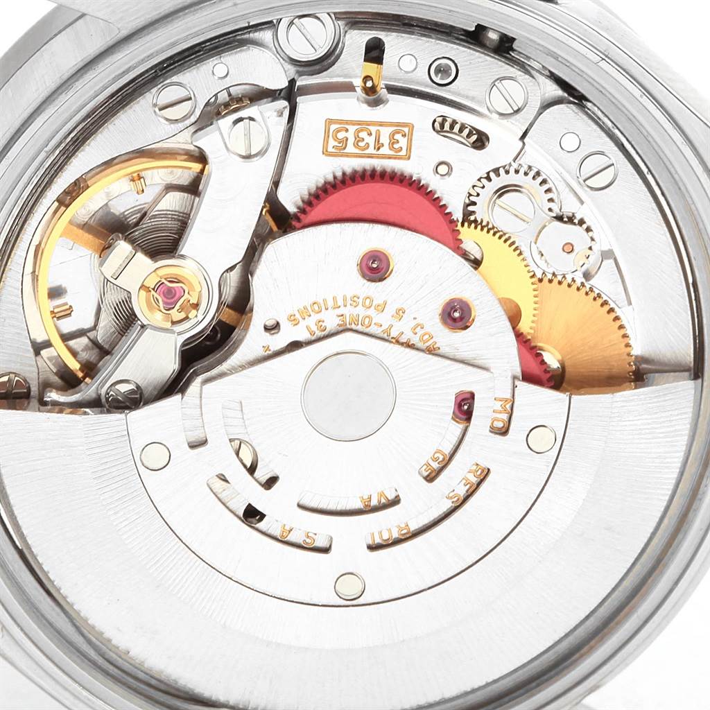 This image shows the movement and internal components of the Rolex Date 15210 Men's Stainless Steel Silver Dial 15210 Men's Stainless Steel Silver Dial model watch at a close-up angle.