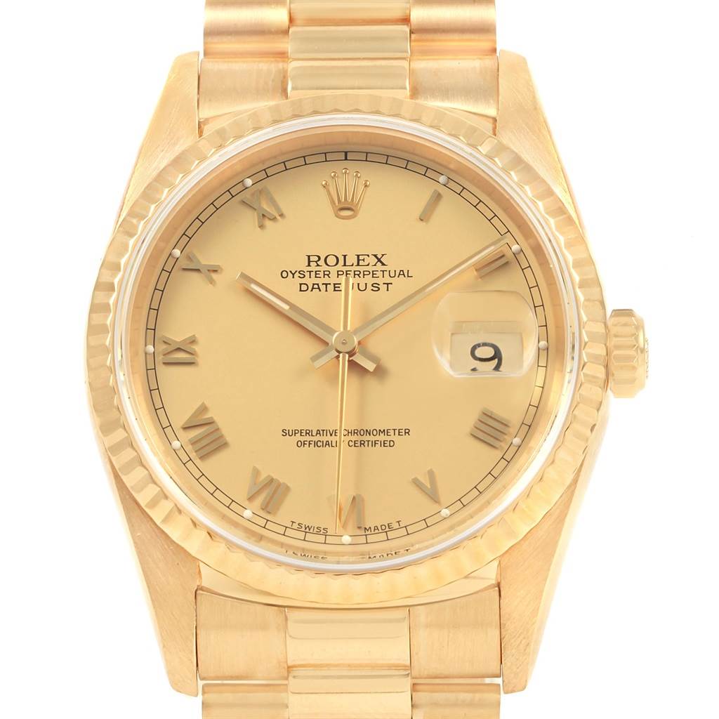 This image shows a Rolex Date 16238 Men's Yellow Gold Champagne Dial 16238 Men's Yellow Gold Champagne Dialjust watch front-facing, highlighting the dial, hands, date window, and part of the gold bracelet.
