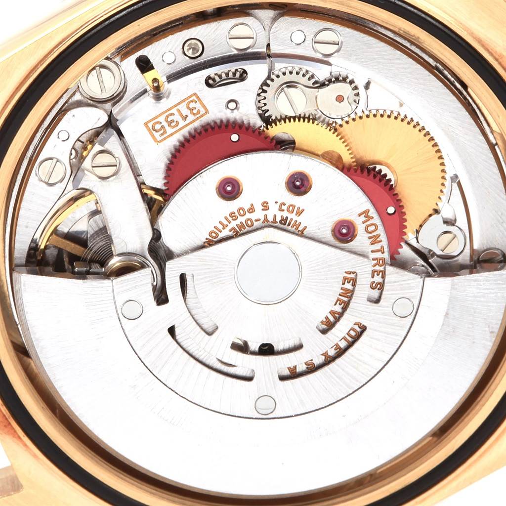 This image shows the internal movement of a Rolex Date 16238 Men's Yellow Gold Champagne Dial 16238 Men's Yellow Gold Champagne Dial model watch, highlighting gears and intricate mechanical parts.